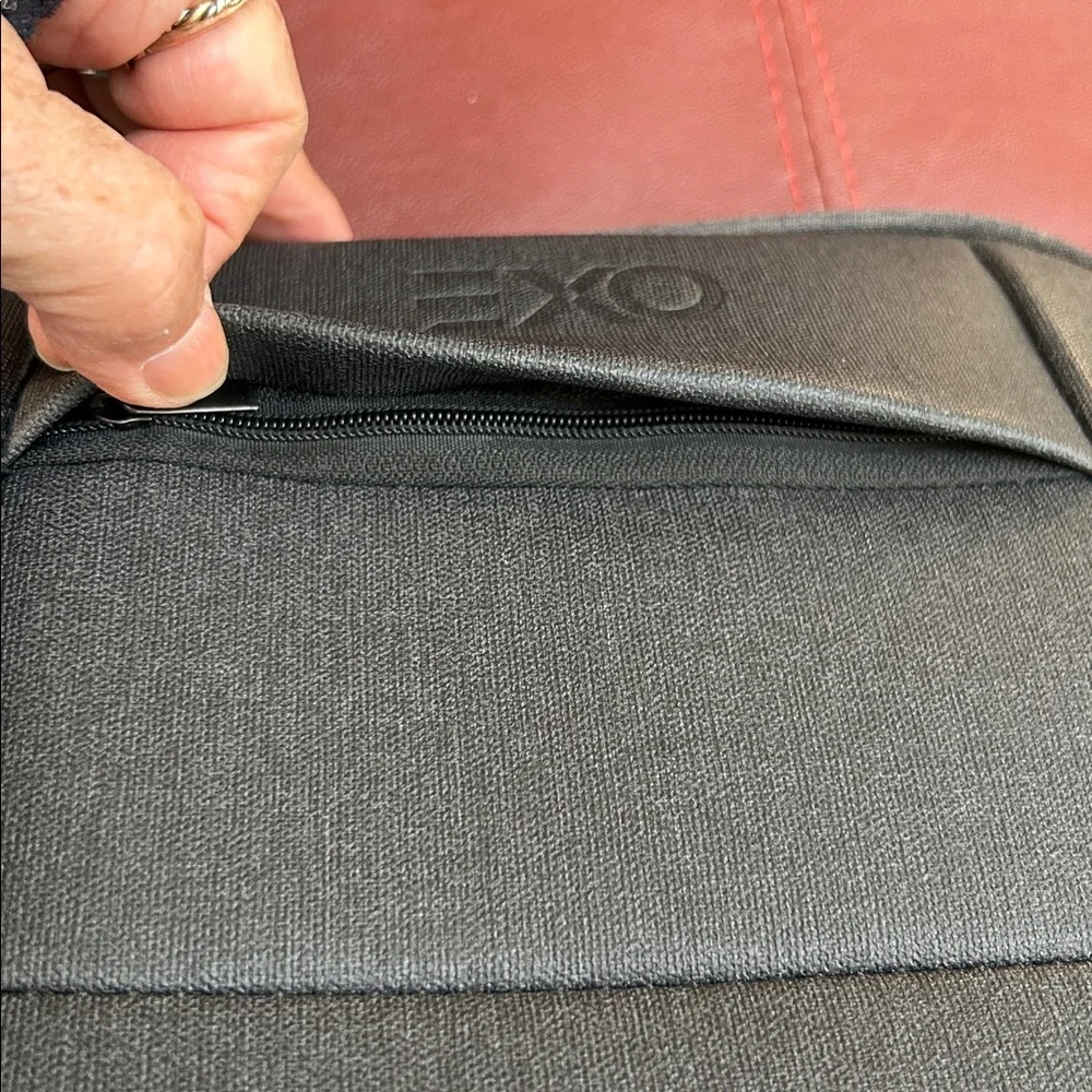 EXO Padded Men's Black Crossbody Bag. Protection for what you carry. 11x8.5”.